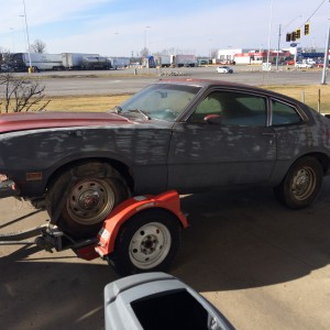 72 Yellow W/Black V8 Grabber on her way Home.